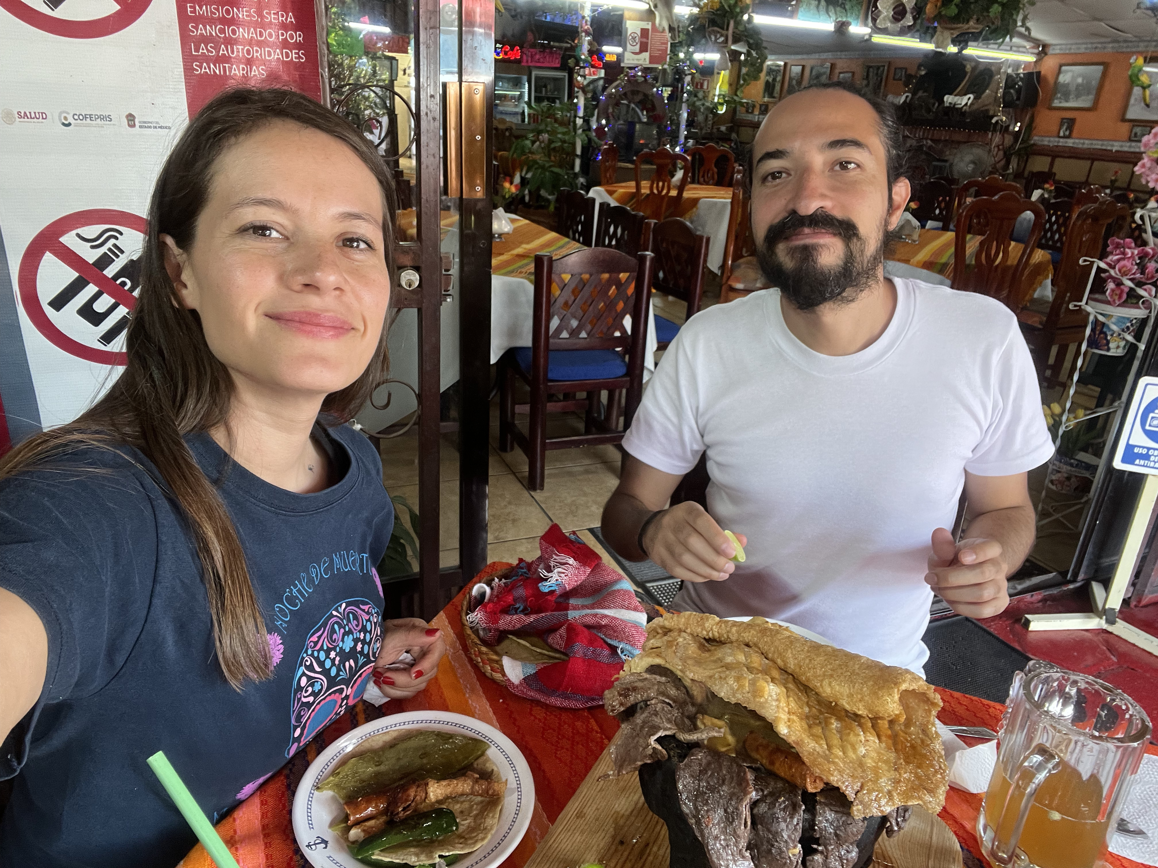 María and Carlos sharing a local food experience