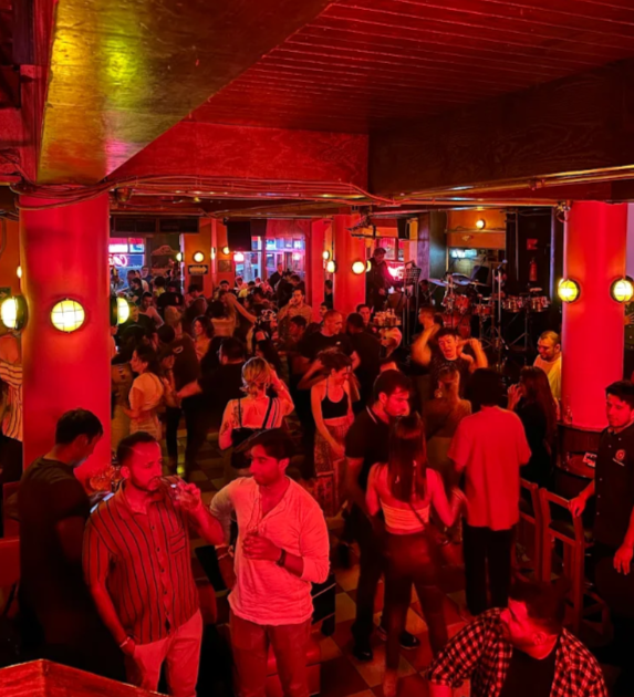 Travelers dancing during a Mexico City night experience